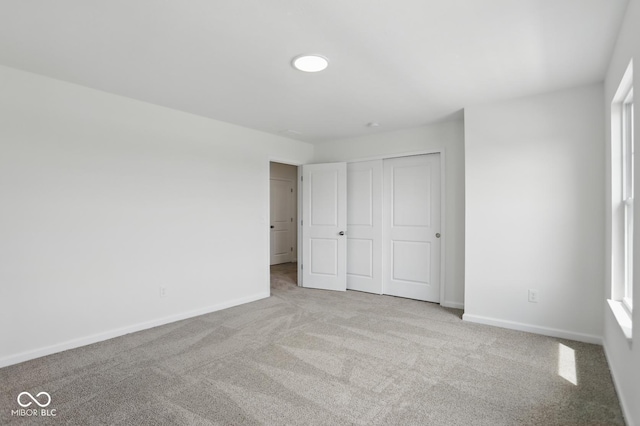 3931 Wren Dr, Brownsburg, IN 46112 - unfurnished bedroom with baseboards, carpet, and a closet