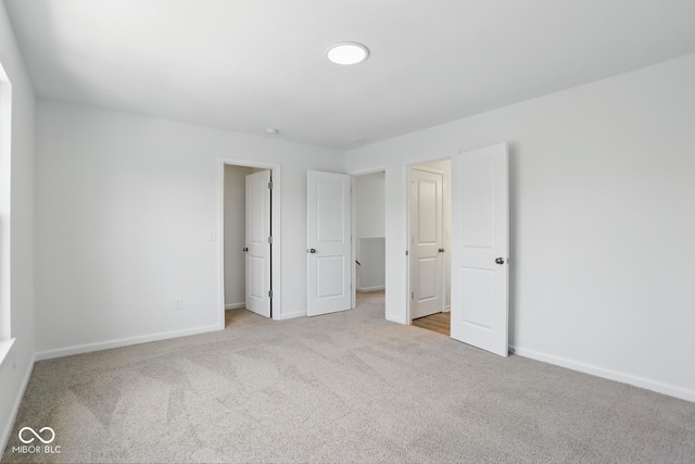 3931 Wren Dr, Brownsburg, IN 46112 - unfurnished bedroom with carpet and baseboards