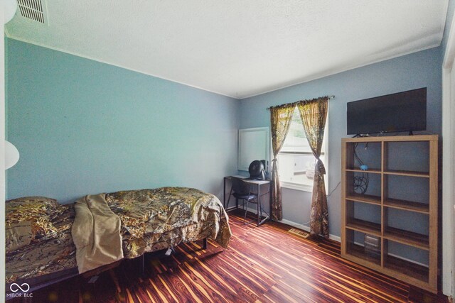 9130 E 18th St, Indianapolis, IN 46229 - bedroom with wood finished floors and baseboards