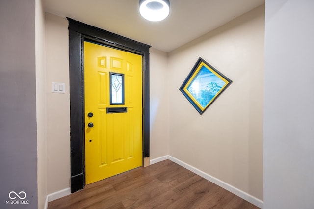 214 S Mcilroy Ave, West Terre Haute, IN 47885 - foyer entrance featuring wood finished floors and baseboards