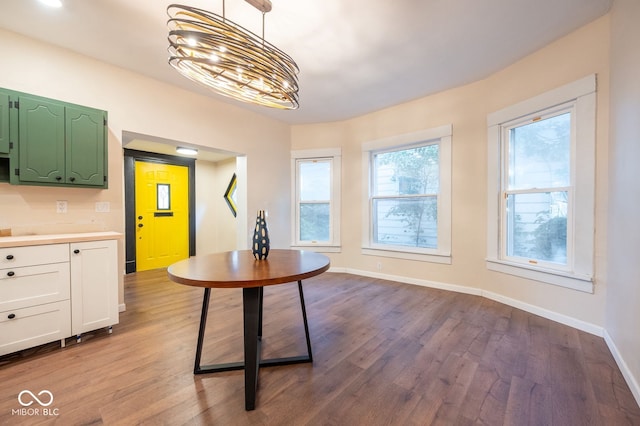 214 S Mcilroy Ave, West Terre Haute, IN 47885 - dining space with dark wood finished floors and baseboards