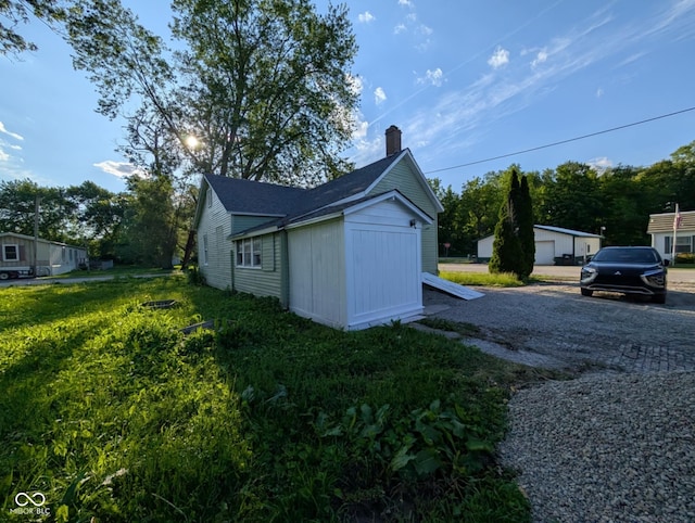 9712 N Price St, Knightsville, IN 47857 - view of home's exterior featuring a chimney