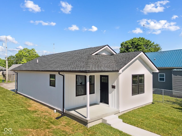302 Highlawn Ave, Seymour, IN 47274 - rear view of property with a shingled roof and a porch