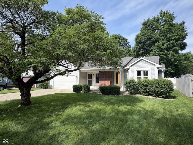 912 Delray Dr, Indianapolis, IN 46241 - view of front of home featuring concrete driveway and a garage