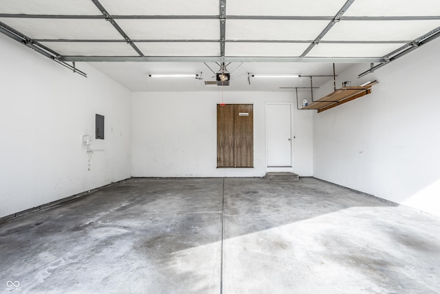 912 Delray Dr, Indianapolis, IN 46241 - garage with electric panel and a garage door opener