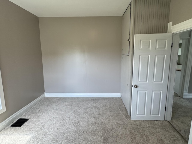 707 N Water St, Hillsboro, IN 47949 - carpeted empty room featuring baseboards