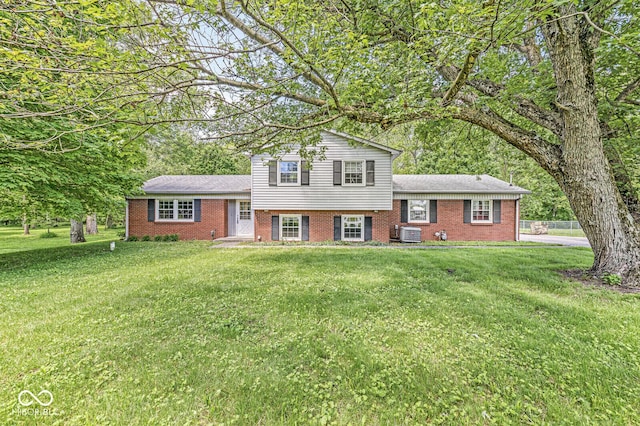 2346 N State Road 39, Danville, IN 46122 - tri-level home with a front lawn, brick siding, and central AC unit