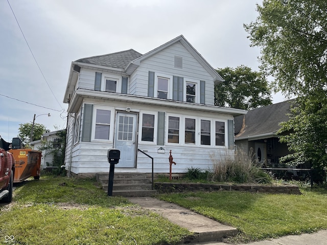 16 S 7th St, West Terre Haute, IN 47885 - view of front of property featuring a front yard and entry steps