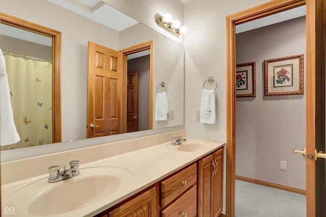 1344 S Fox Paw Dr, New Palestine, IN 46163 - full bathroom featuring double vanity and baseboards
