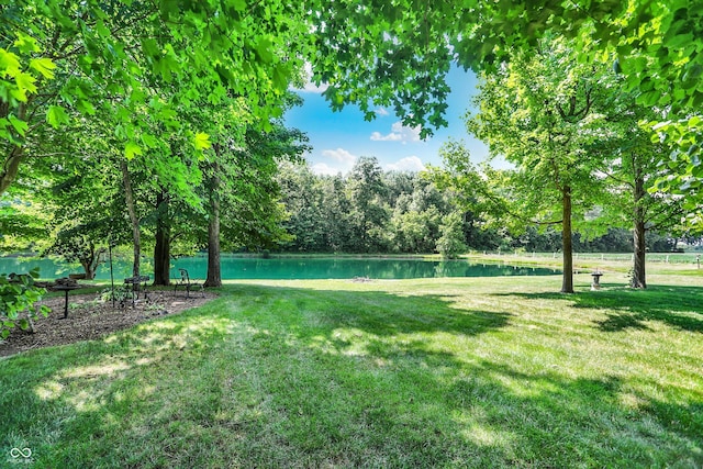 1344 S Fox Paw Dr, New Palestine, IN 46163 - view of grassy yard featuring a water view