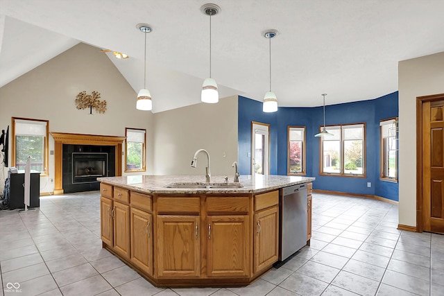 1344 S Fox Paw Dr, New Palestine, IN 46163 - kitchen featuring dishwasher, light tile patterned flooring, healthy amount of natural light, light stone countertops, and lofted ceiling