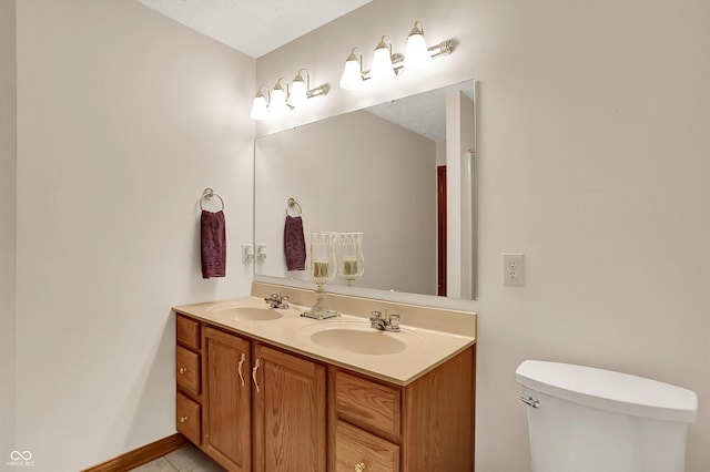 1344 S Fox Paw Dr, New Palestine, IN 46163 - bathroom featuring double vanity and tile patterned floors