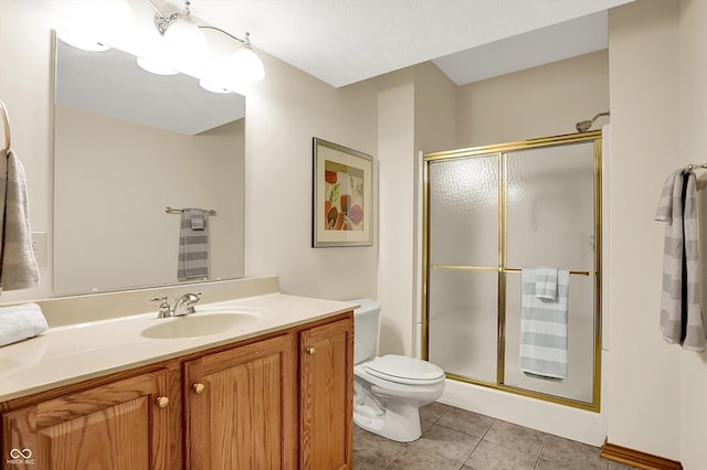 1344 S Fox Paw Dr, New Palestine, IN 46163 - bathroom with a shower stall, vanity, and tile patterned flooring