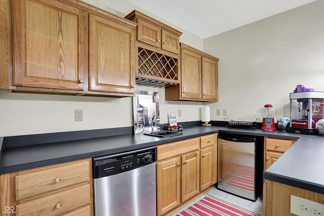 1344 S Fox Paw Dr, New Palestine, IN 46163 - kitchen with stainless steel dishwasher, dishwasher, and dark countertops