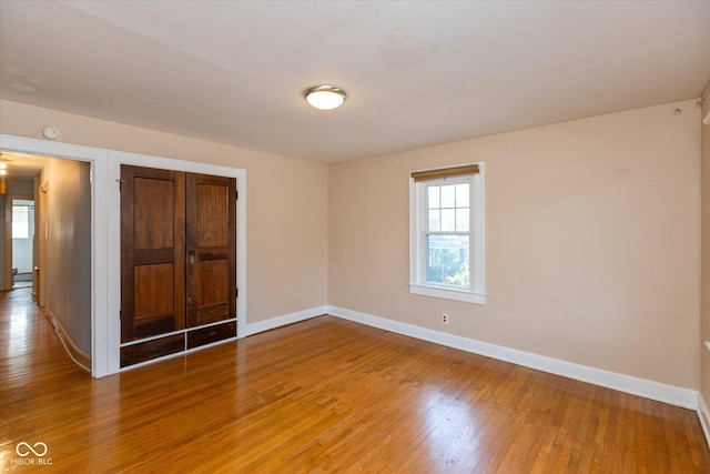 1015 Fairfield Ave, Indianapolis, IN 46205 - unfurnished bedroom featuring light wood finished floors and baseboards