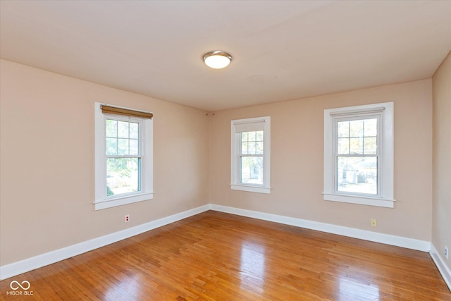 1015 Fairfield Ave, Indianapolis, IN 46205 - spare room featuring light wood-style floors and baseboards