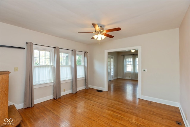 1015 Fairfield Ave, Indianapolis, IN 46205 - empty room with a ceiling fan, light wood-style floors, and baseboards