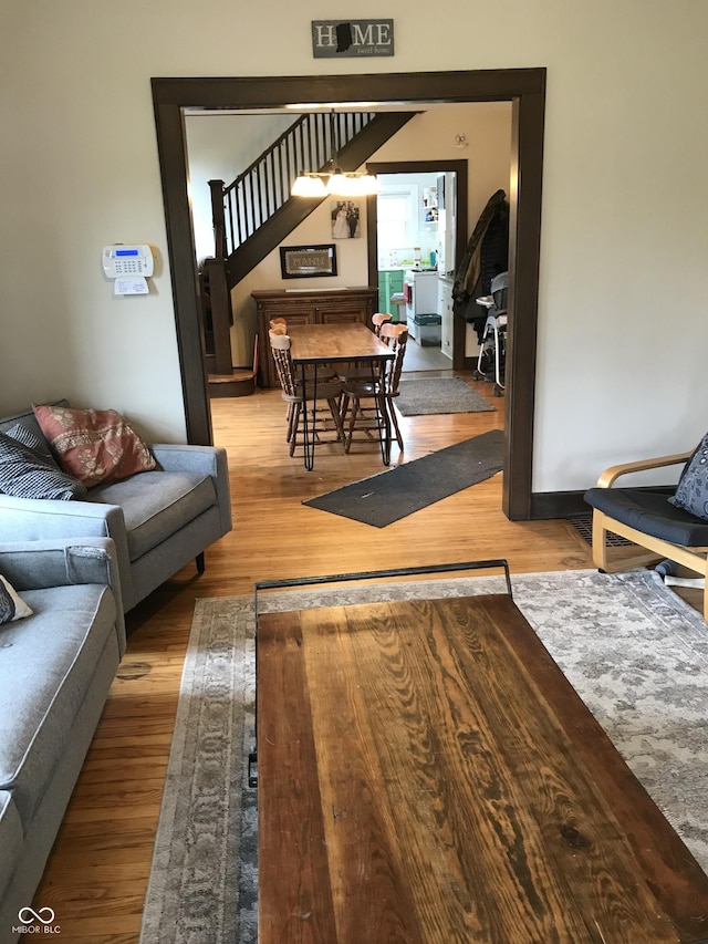 1015 Fairfield Ave, Indianapolis, IN 46205 - living area with stairs and wood finished floors
