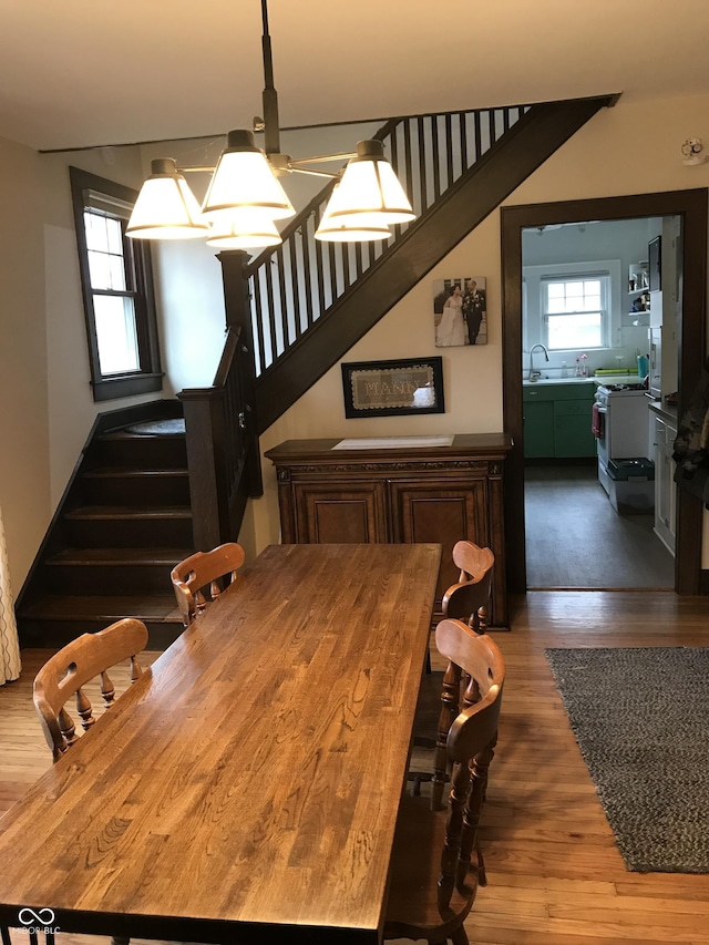 1015 Fairfield Ave, Indianapolis, IN 46205 - dining space featuring stairs and wood finished floors