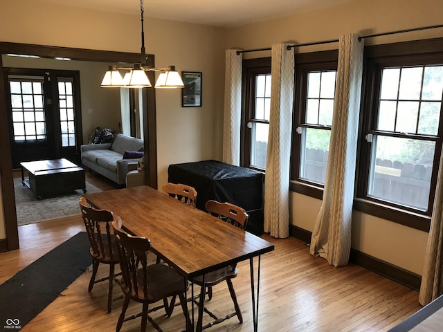 1015 Fairfield Ave, Indianapolis, IN 46205 - dining area with light wood-style floors and baseboards