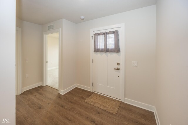 1863 River Birch Dr, Greenfield, IN 46140 - entryway with dark wood-style floors and baseboards