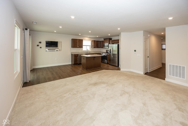 1863 River Birch Dr, Greenfield, IN 46140 - kitchen featuring stainless steel appliances, a center island, recessed lighting, open floor plan, and a sink