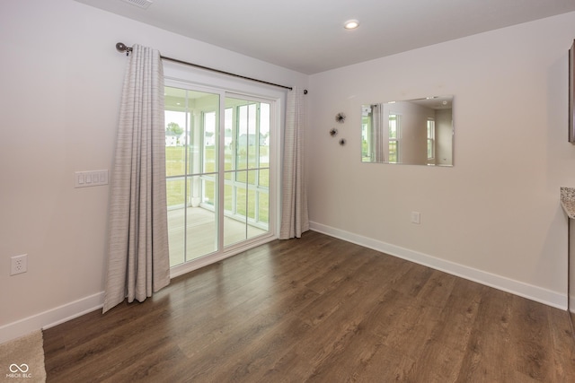 1863 River Birch Dr, Greenfield, IN 46140 - spare room featuring baseboards, wood finished floors, and recessed lighting