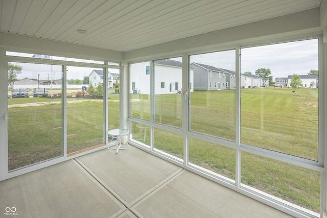 1863 River Birch Dr, Greenfield, IN 46140 - unfurnished sunroom with healthy amount of natural light and a residential view