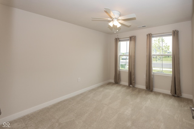 1863 River Birch Dr, Greenfield, IN 46140 - empty room with light colored carpet, baseboards, and ceiling fan