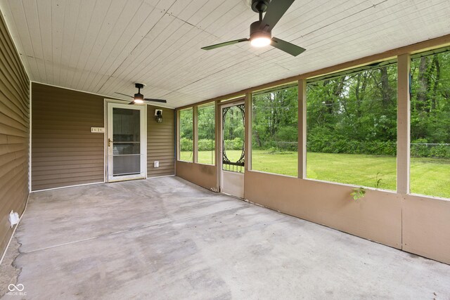 5422 Orange St, Indianapolis, IN 46203 - unfurnished sunroom featuring a ceiling fan