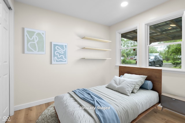 5422 Orange St, Indianapolis, IN 46203 - bedroom featuring baseboards, recessed lighting, and wood finished floors