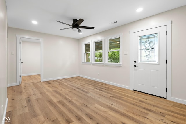 5422 Orange St, Indianapolis, IN 46203 - entrance foyer featuring plenty of natural light, light wood-style floors, baseboards, and recessed lighting