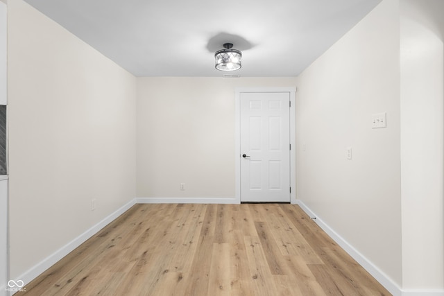 5422 Orange St, Indianapolis, IN 46203 - empty room with baseboards and light wood-type flooring