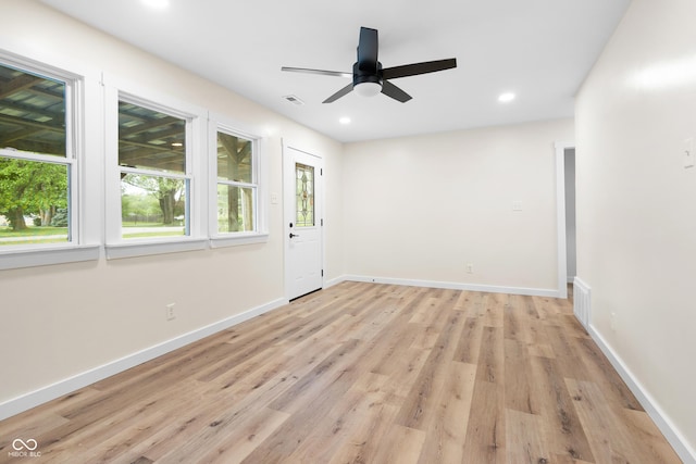 5422 Orange St, Indianapolis, IN 46203 - spare room with a ceiling fan, light wood-style flooring, recessed lighting, and baseboards