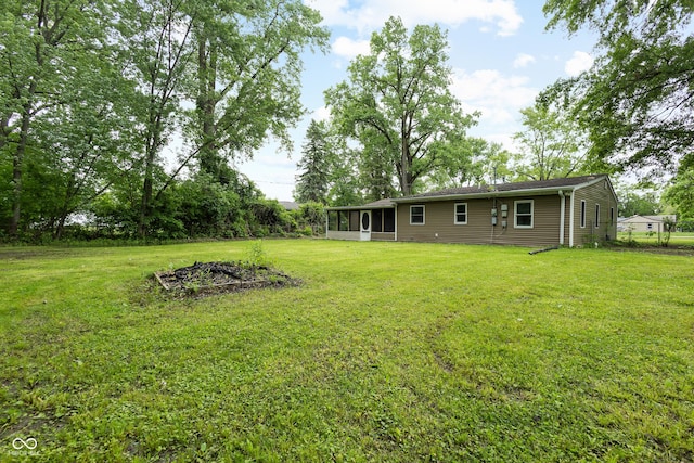 5422 Orange St, Indianapolis, IN 46203 - view of green lawn with a sunroom