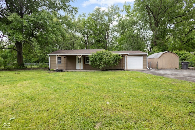 5422 Orange St, Indianapolis, IN 46203 - single story home with driveway, a porch, an attached garage, and view of scattered trees