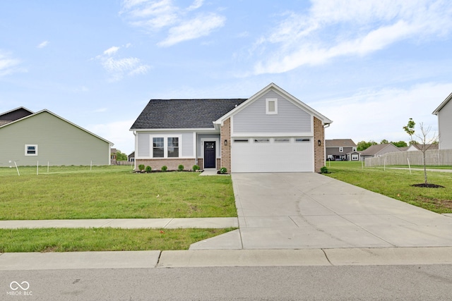 637 N Quartz Ln, Fortville, IN 46040 - traditional-style home with brick siding, an attached garage, and concrete driveway