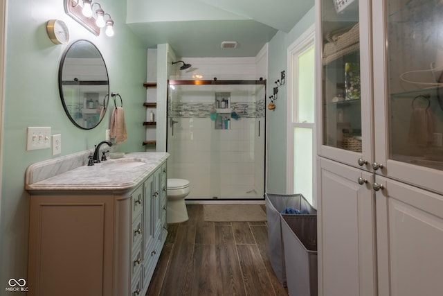 6799 Lakeshore Dr, Avon, IN 46123 - bathroom with wood finished floors, vanity, a shower stall, and toilet