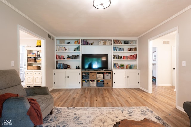 6799 Lakeshore Dr, Avon, IN 46123 - living room with light wood-type flooring, crown molding, baseboards, and built in features