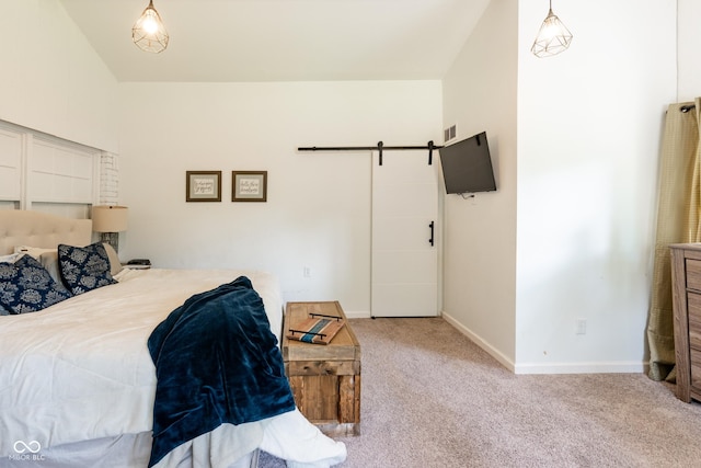 6799 Lakeshore Dr, Avon, IN 46123 - bedroom with a barn door, light carpet, and baseboards
