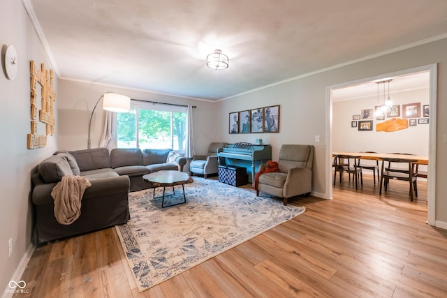6799 Lakeshore Dr, Avon, IN 46123 - living room featuring light wood-style flooring, ornamental molding, and baseboards