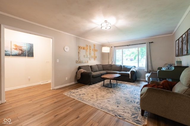 6799 Lakeshore Dr, Avon, IN 46123 - living area featuring light wood-style flooring, crown molding, and baseboards