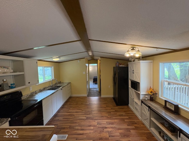 15003 Pheasant Dr, Brookville, IN 47012 - kitchen featuring black appliances, a textured ceiling, white cabinetry, dark wood-type flooring, and a sink