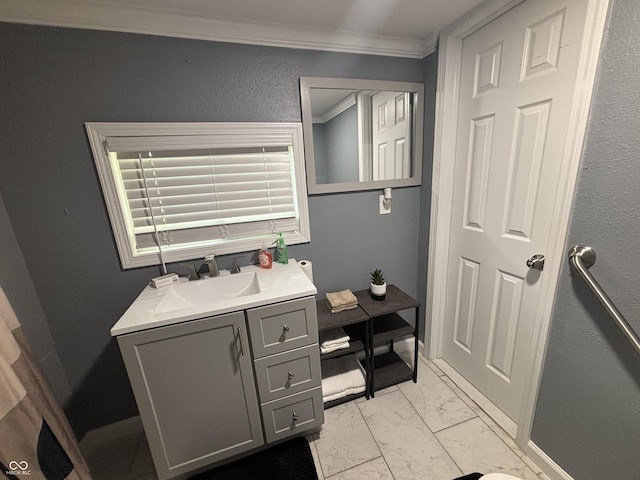 3041 S Rybolt Ave, Indianapolis, IN 46241 - bathroom featuring marble finish flooring, vanity, and crown molding