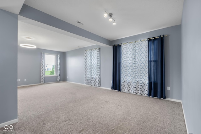 2502 Creekland Dr, Columbus, IN 47201 - spare room with carpet flooring and baseboards
