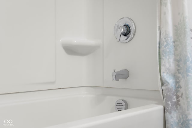 2502 Creekland Dr, Columbus, IN 47201 - bathroom view of shower / bath combo with shower curtain