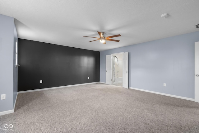 2502 Creekland Dr, Columbus, IN 47201 - spare room with a ceiling fan, a smoke detector, carpet floors, and baseboards
