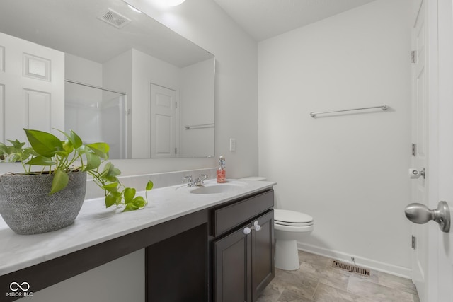 2502 Creekland Dr, Columbus, IN 47201 - full bath with vanity, baseboards, toilet, and a shower