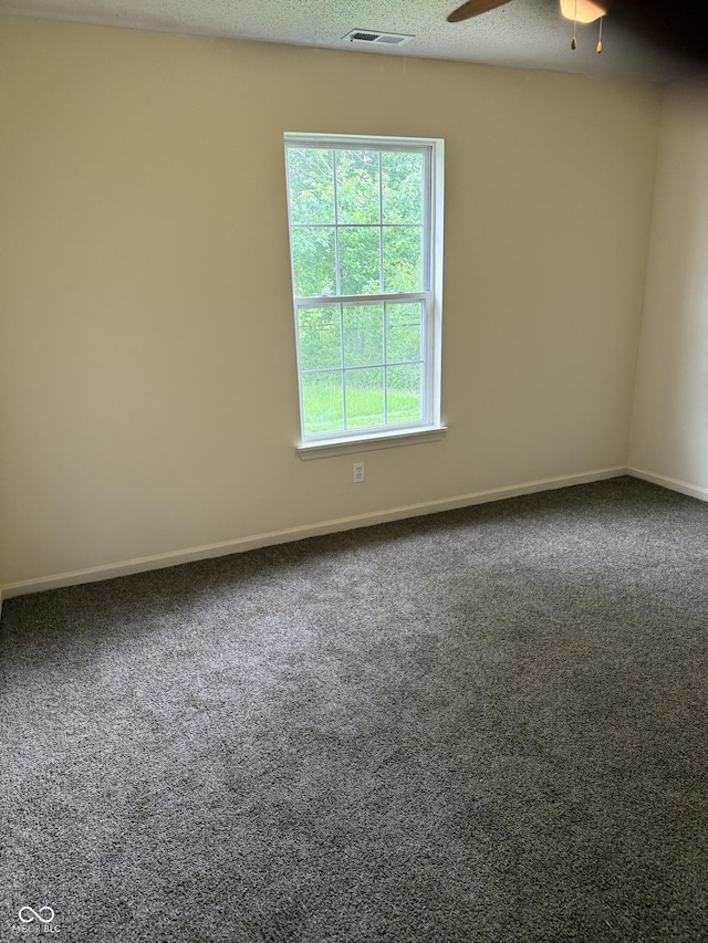 1009 Springwater Rd, Kokomo, IN 46902 - unfurnished room featuring carpet flooring, a ceiling fan, and baseboards