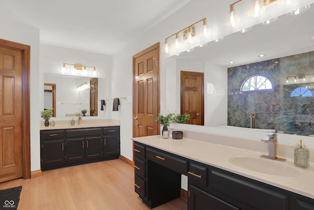 545 Walnut Woods Dr, Greenwood, IN 46142 - full bathroom featuring vanity and wood finished floors